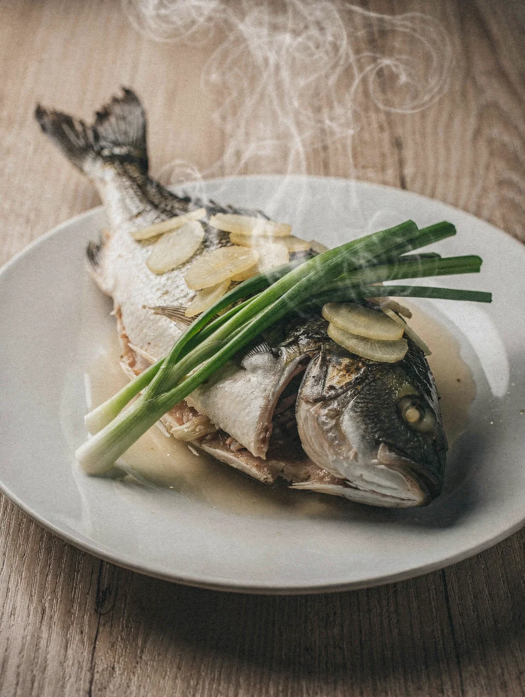Steamed sea bass with ginger and soy